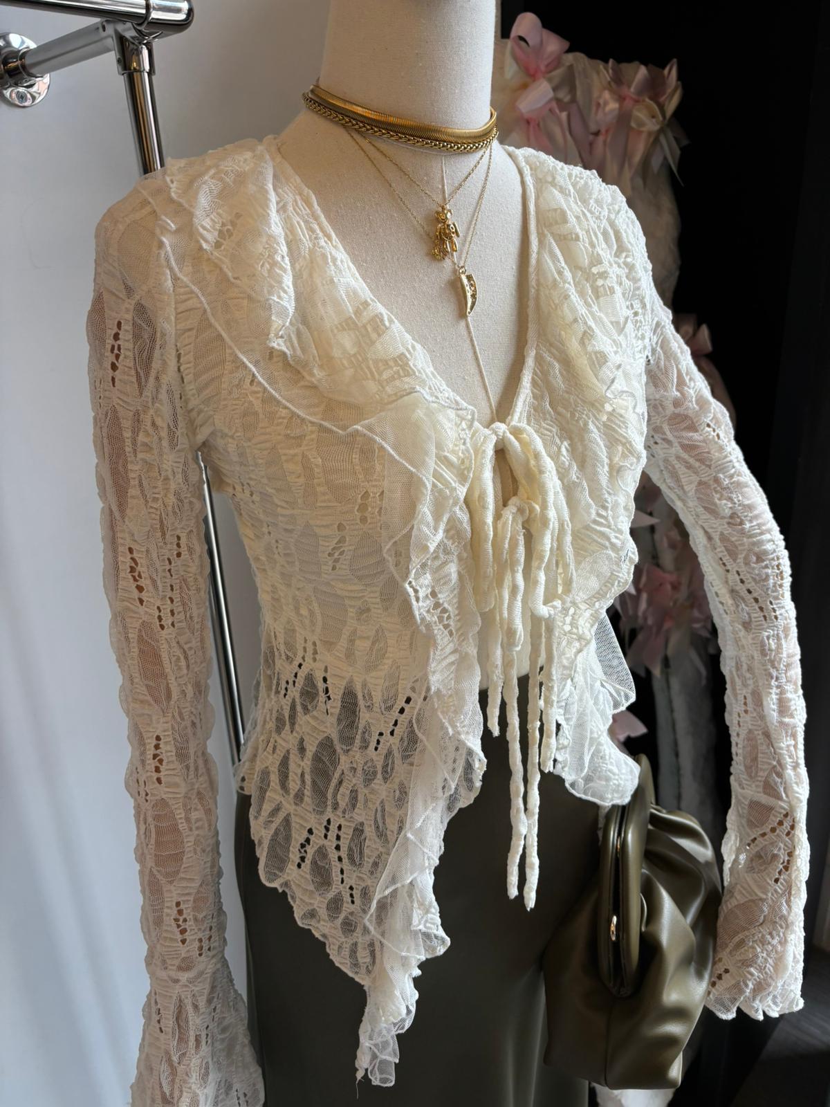 Maglia di pizzo aperta con rouge