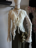 Maglia di pizzo aperta con rouge